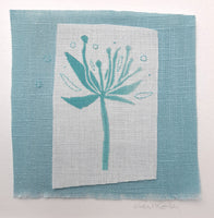 Turquoise flower with seeds ~ hand stitched linen collage
