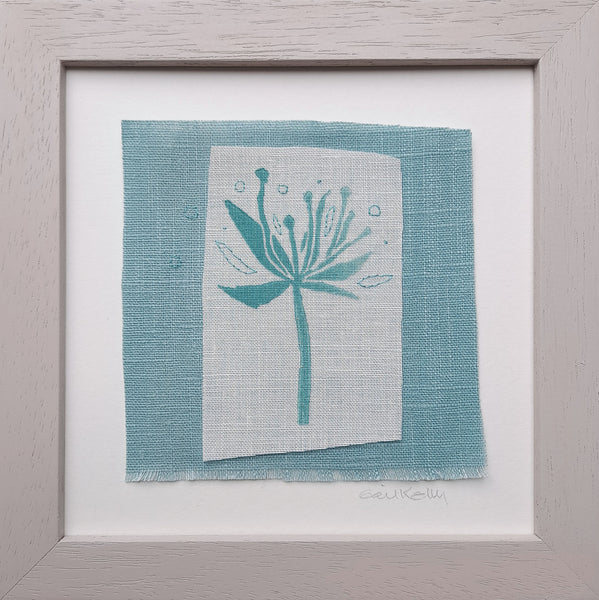 Turquoise flower with seeds ~ hand stitched linen collage